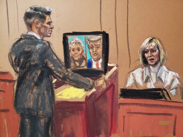 Former Elle magazine advice columnist E. Jean Carroll answers questions from her lawyer Michael Ferrara during a civil trial to decide whether former U.S. President Donald Trump raped Carroll in a Bergdorf Goodman department store dressing room in the mid-1990s, and defamed her by denying it happened, in New York, U.S., April 27, 2023 in this courtroom sketch. REUTERS/Jane Rosenberg