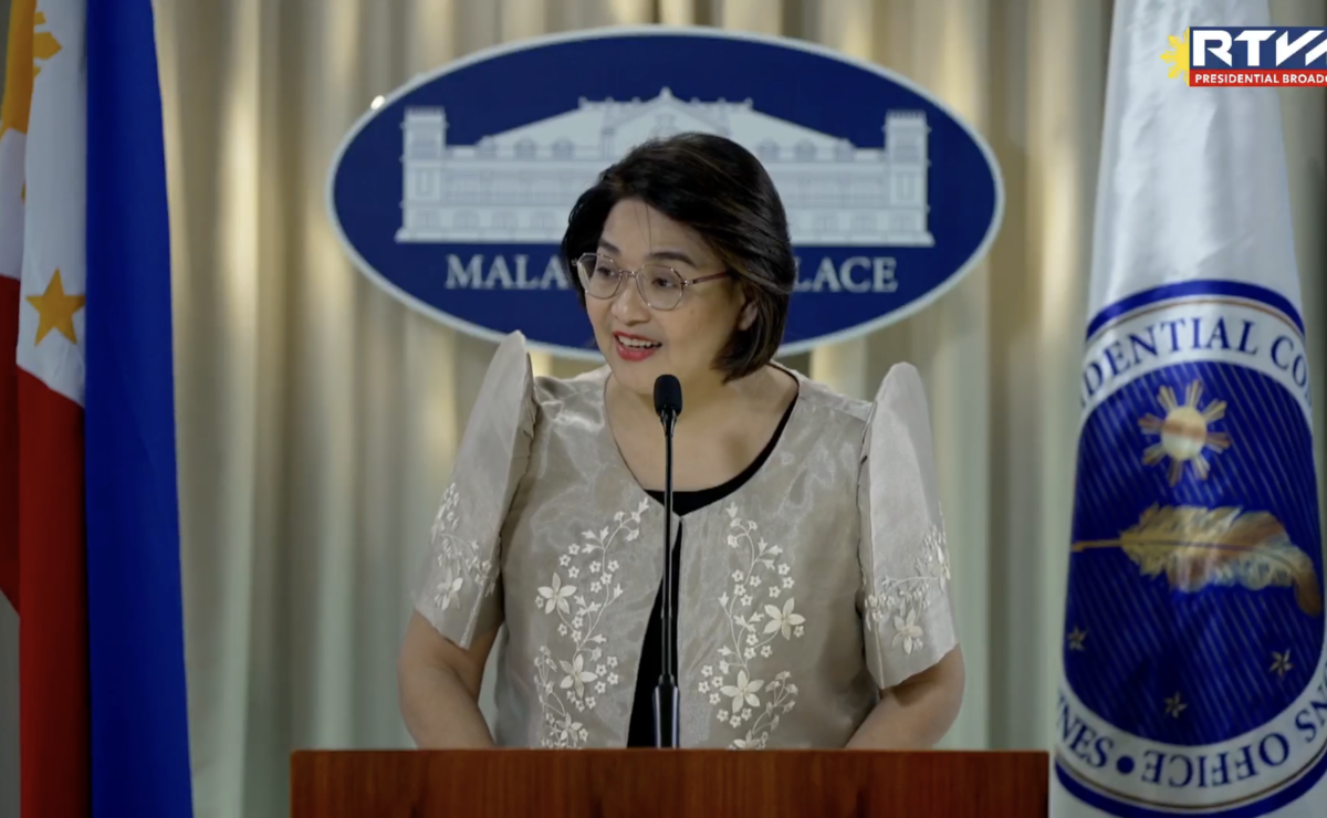 Palace press officer Undersecretary Claire Castro fields questions during a press conference. She says the proposed wage increase in under review.